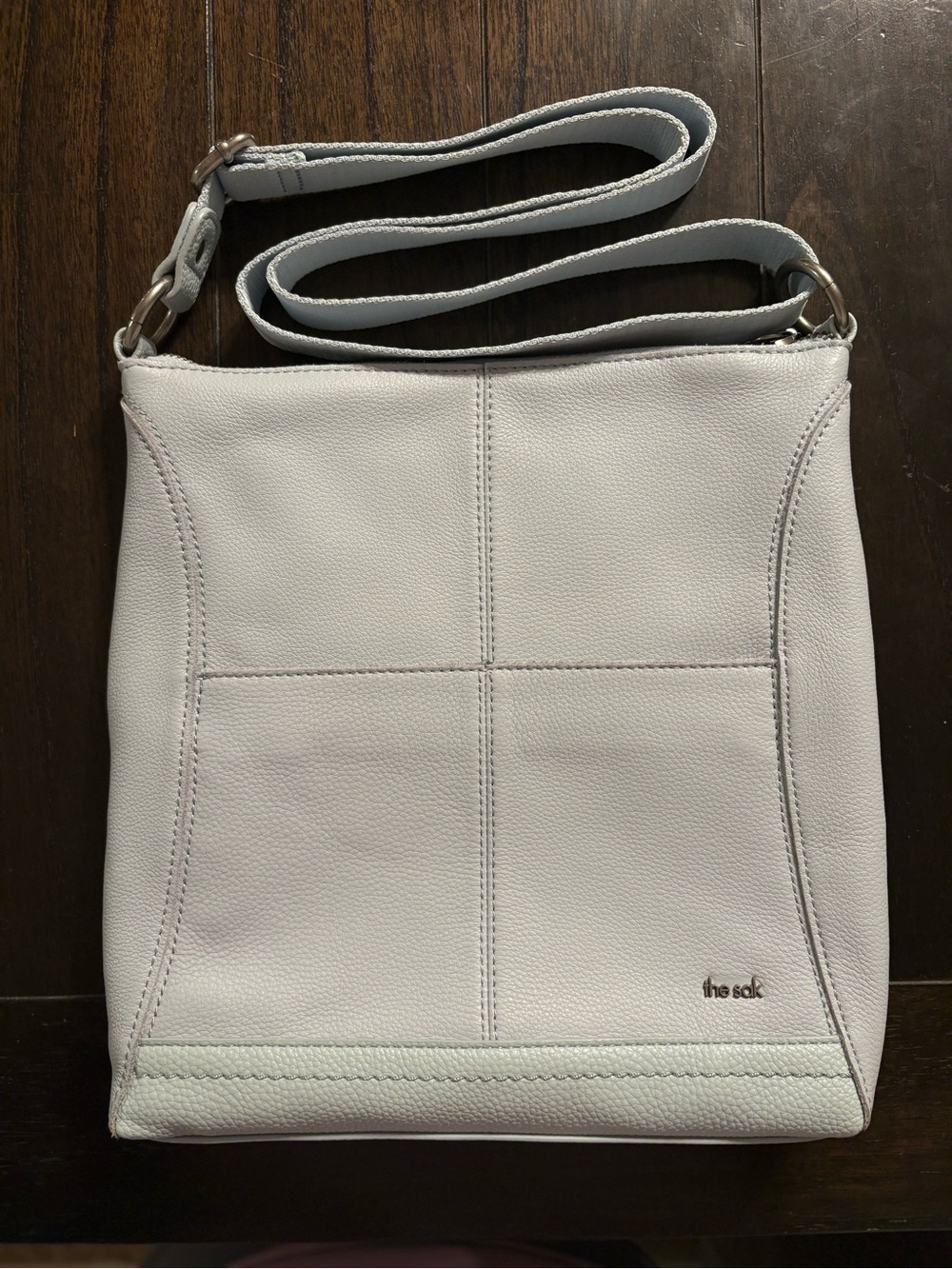 The Sak Light Blue Leather Crossbody Bag with Subtle Stitch Detail